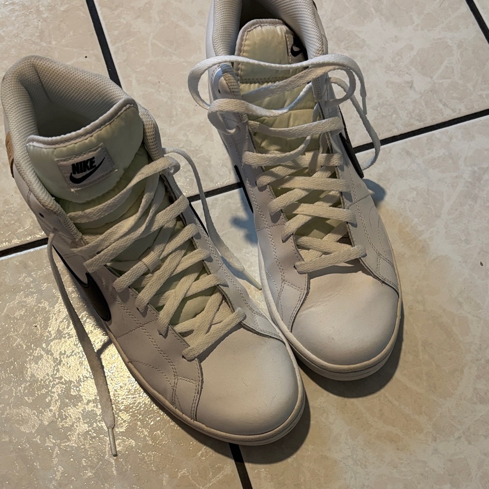 Nike White High-Top Sneakers with Black Swoosh Accent